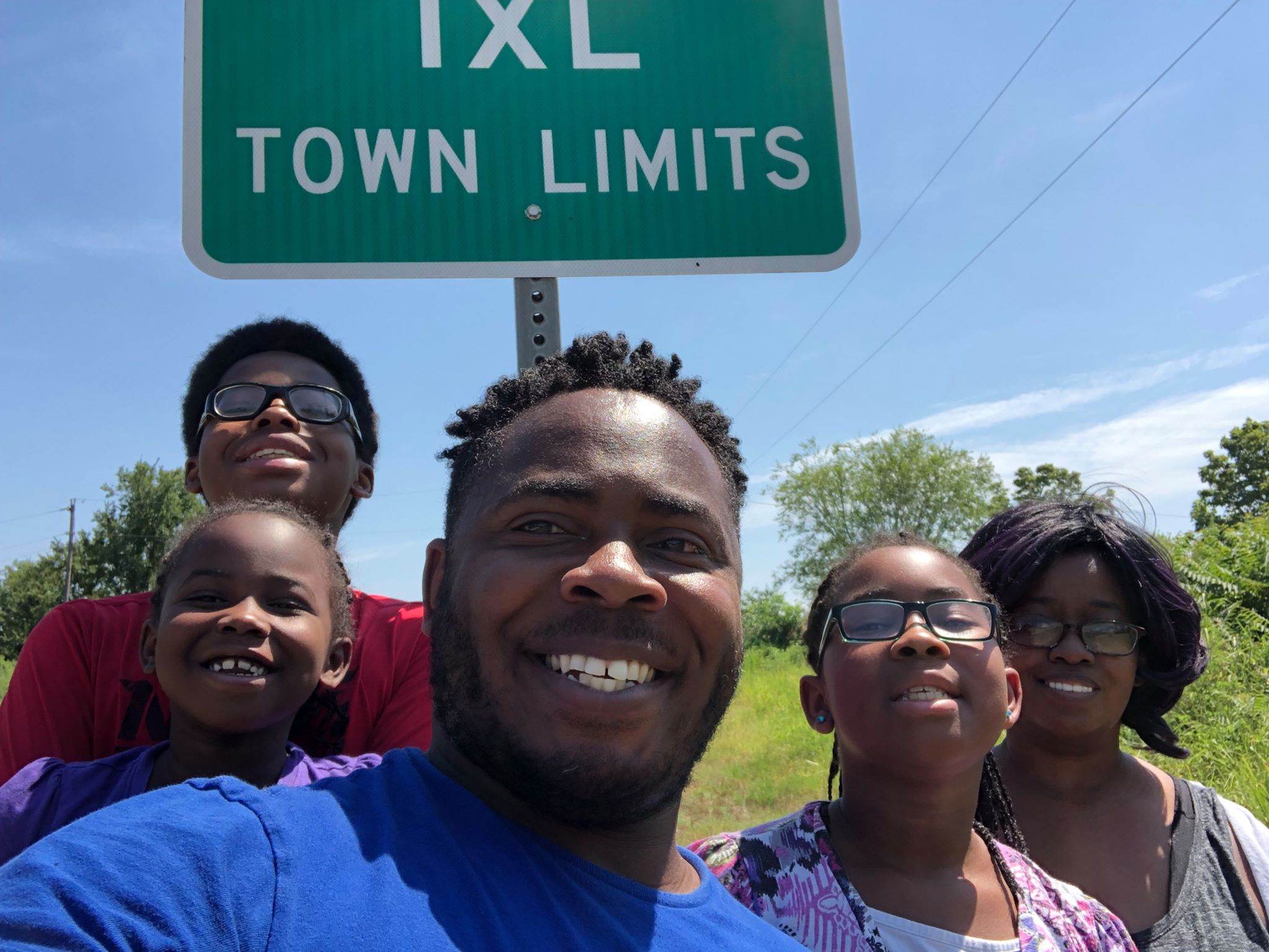 IXL Town Limits sign